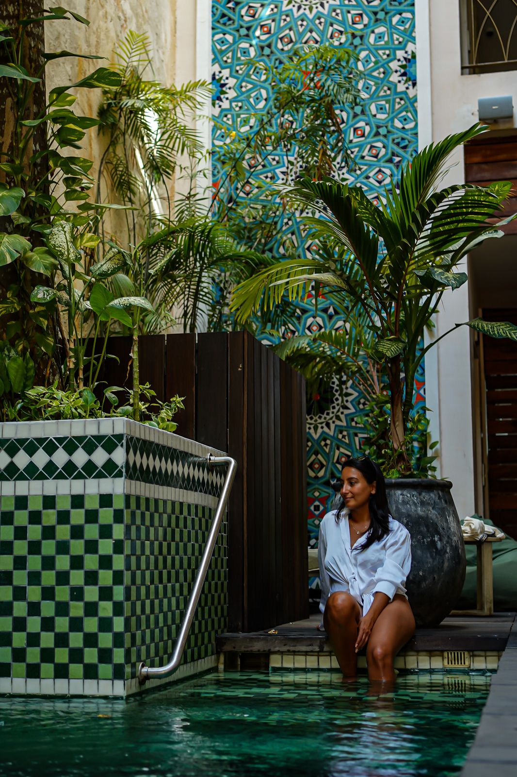 Green mosaic courtyard pool